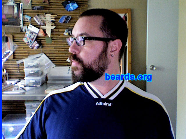 Gryphon M.
Bearded since: 1995.  I am a dedicated, permanent beard grower.

Comments:
I grew my beard because I admire beards on men and grew up with bearded men. Once I had a job where my employer didn't complain about me being bearded, I stopped shaving.

How do I feel about my beard? It's full and thick, multi-colored. I just want to grow it longer without it getting all frazzled. I've changed it a lot over the years, but I keep coming back to the full beard, often with the cheeks a bit shorter than the chin.
Keywords: full_beard