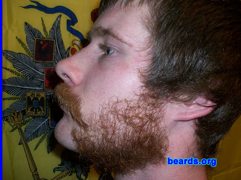 Jordan
Bearded since: 2006.  I am a dedicated, permanent beard grower.

Comments:
I grew my beard because I am the only one in my family who dares to just let it grow.

How do I feel about my beard? Awesome! Currently with the chops right now. It seems to be getting thicker and growing faster. Red beards rock!
Keywords: mutton_chops