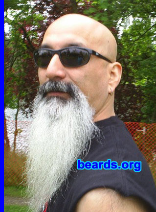 Nick M.
Bearded since: 2003.  I am a dedicated, permanent beard grower.

Comments:
I grew my beard because I am lucky to have two jobs that allow me to grow my beard/goatee as long as I please. I didn't want to look like everyone else that has either a trimmed out goatee or one with just a mustache!

How do I feel about my beard?  I love it!!
Keywords: goatee_mustache