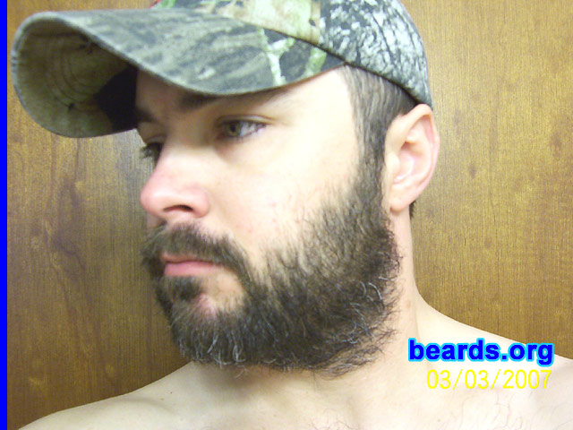 Shawn
Bearded since: 2007.  I am a dedicated, permanent beard grower.

Comments:
I grew my beard because I started for hunting season and just went on without shaving.

How do I feel about my beard?  It is now at the point where I think I want it I keep it at a # 6 on the Wahl trimmer and trim it weekly or so if I have the time. I do not do any neck lines, etc.  I believe that if I am to grow a beard, I want it all natural with just a fresh clip to keep the length in control.  That is the main reason for a beard, to be maintenance-free. My beard isn't perfect (super thick) like some of the others on here, but I am glad to be able to grow one.  I know guys that can't.  Also I have silver hairs coming in pretty steady.  I am very happy with this and see no reason to hide it.  After all, a man should be a man, not some clean-shaved boy model.
Keywords: full_beard