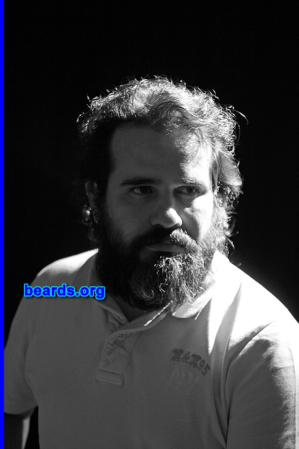 Abraham M.
Bearded since: 2012. I am a dedicated, permanent beard grower.

Comments:
Why did I grow my beard? A few years ago I got some clippers to stop using razors to shave my face.  So I started to just using the clippers to always have the "afternoon shadow" because at the office I where used to work they had pretty stupid regulations regarding facial hair. But by the middle of 2012, I started a project of my own.  So I'm in a way my own boss and I started to grow my beard. I'm a software developer trying to break the paradigm that we have to look like executives pretty neatly shaved... And since my associates are artists they don't care if I look like a stock broker from the movie "Wall Street".

How do I feel about my beard? It just feels great.  When I got comfortable with the sensation and the moment I managed overcome the itchiness, it just was great to look at my face in a different way. By the end of February this year I had to shave it and I got sad.  My face just looked strange to me... I looked at myself in the mirror and I hated not to have my beard anymore, but I knew that was going to be temporary.

I have my beard again and I feel good about it. People tend to make prejudiced comments but I do not give importance because they make them out of ignorance and misconceptions of what is socially acceptable, I feel great and that's what matters.
Keywords: full_beard