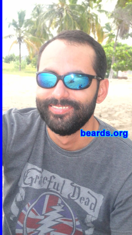 Giovanni P.
Bearded since:2010.  I am an experimental beard grower.

Comments:
I always wanted to grow a beard, but I never passed the ten-day mark before.  My idea was to make a video daily to see the difference.  But after a few days, only the photos remained.  This time, I passed the ten-day mark, but there was not a single photo of my beard until that day.  After that, I took pictures every ten days.  Right now I am at thirty-nine days without shaving.  Only the neck line was done at day nineteen because my vacation ended.

Thanks to my vacation and the encouragement of my girlfriend, my beard is still growing and I am living the experience I always wanted: to be a bearded man.

These pics are from day 30.

How do I feel about my beard? I simply love it.  All I can say is that it is a shame that I never tried before.  It feels so good to go to work or to hang around looking like this. It's beautiful to watch it grow and to see your cheeks get darker everyday.

My girlfriend loves it.  I get a lot of positive responses to my beard and my beard style.  My choice was the full beard because that's the look I always wanted. Women look at me in a different way. From days ten to twenty, it was like a lifetime.  It passed so slowly.  Now, in a blink of an eye, I am waiting for tomorrow, for my day forty photos.
Keywords: full_beard