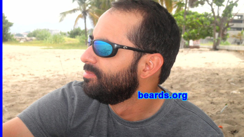 Giovanni P.
Bearded since:2010.  I am an experimental beard grower.

Comments:
I always wanted to grow a beard, but I never passed the ten-day mark before.  My idea was to make a video daily to see the difference.  But after a few days, only the photos remained.  This time, I passed the ten-day mark, but there was not a single photo of my beard until that day.  After that, I took pictures every ten days.  Right now I am at thirty-nine days without shaving.  Only the neck line was done at day nineteen because my vacation ended.

Thanks to my vacation and the encouragement of my girlfriend, my beard is still growing and I am living the experience I always wanted: to be a bearded man.

These pics are from day 30.

How do I feel about my beard? I simply love it.  All I can say is that it is a shame that I never tried before.  It feels so good to go to work or to hang around looking like this. It's beautiful to watch it grow and to see your cheeks get darker everyday.

My girlfriend loves it.  I get a lot of positive responses to my beard and my beard style.  My choice was the full beard because that's the look I always wanted. Women look at me in a different way. From days ten to twenty, it was like a lifetime.  It passed so slowly.  Now, in a blink of an eye, I am waiting for tomorrow, for my day forty photos.
Keywords: full_beard