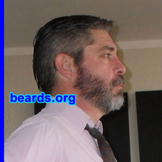 Johnnie A.
Bearded since: 2010.  I am a dedicated, permanent beard grower.

Comments:
I grew my beard because it is something I have always wanted to do and have been trying on and off for several years.

How do I feel about my beard? I have had my beard for four months now and am extremely happy. I just want to be able to grow it longer without feeling I have to trim it all the time.
Keywords: full_beard